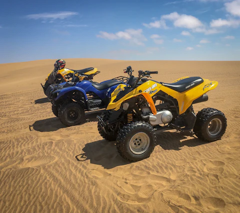ATV quad bike rental Dubai desert adventure sand dunes UAE