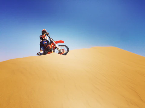 Dirt bike motocross Dubai desert tour UAE sand dunes