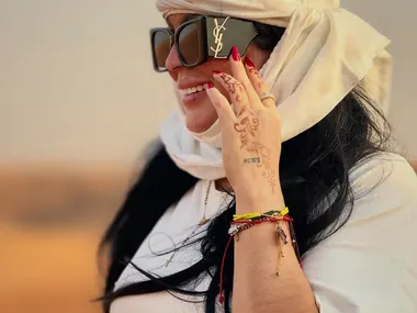 Guest with henna art at the desert camp